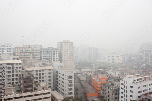 Bangladesh – January 06, 2014: This is winter afternoon aerial views of dhaka city. Heavy foggy winter cross of the city of Dhaka.