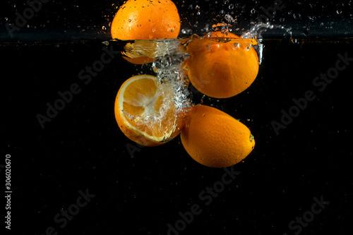 fresh two lemons in the water