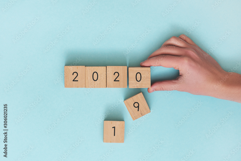 Wooden cubes year 2019 change to 2020. - obrazy, fototapety, plakaty 