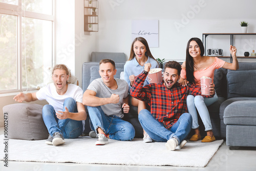 Group of friends watching s...