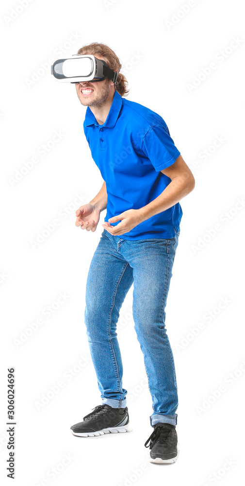 Young man with VR glasses on white background Young man with VR glasses on white background