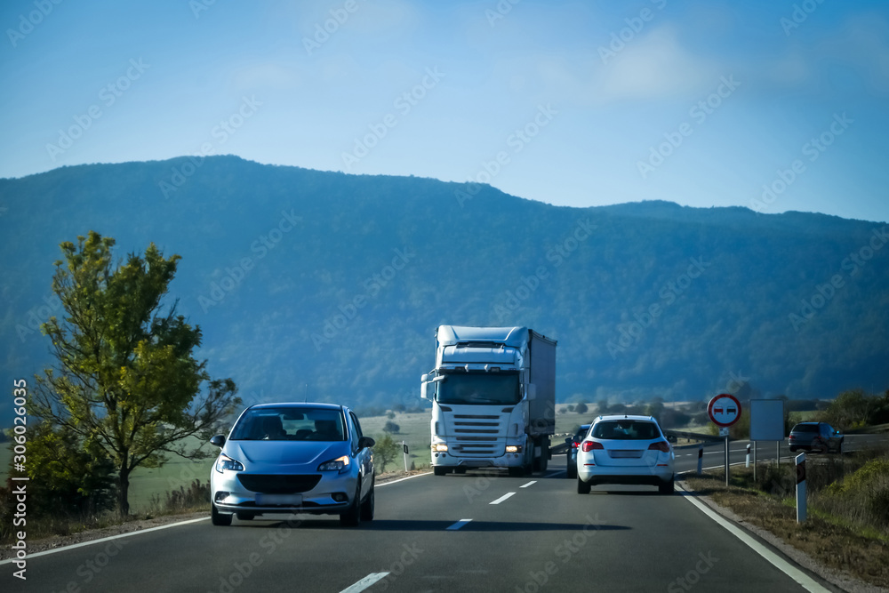 Road with traffic and landscape