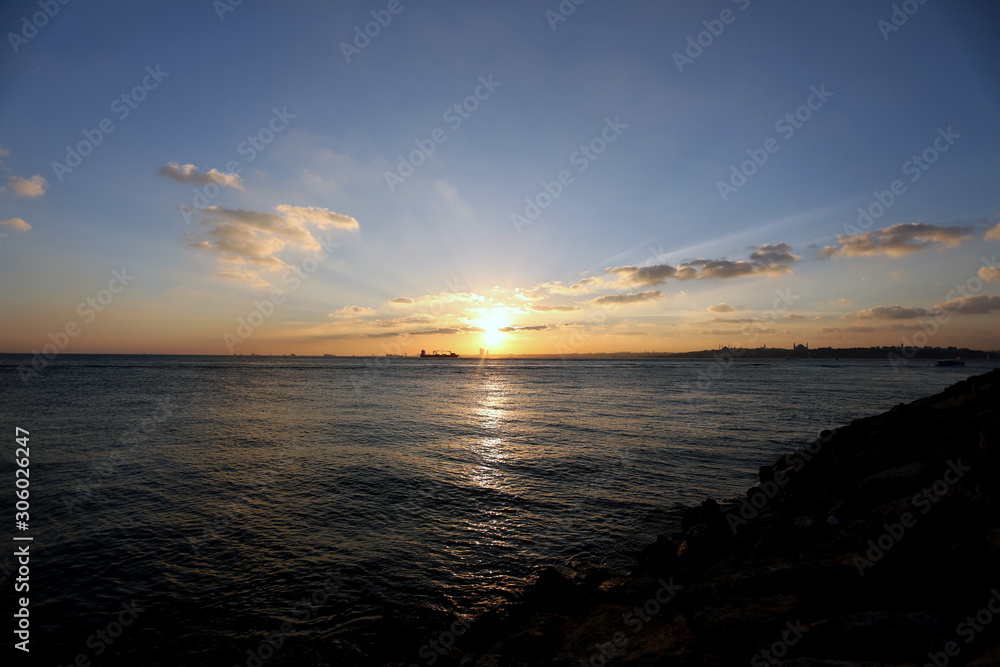 Sunset view of marmara sea and cargo ship