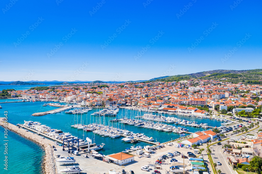 Town of Vodice, marina and turquoise coastline on Adriatic coast, aerial view, Croatia