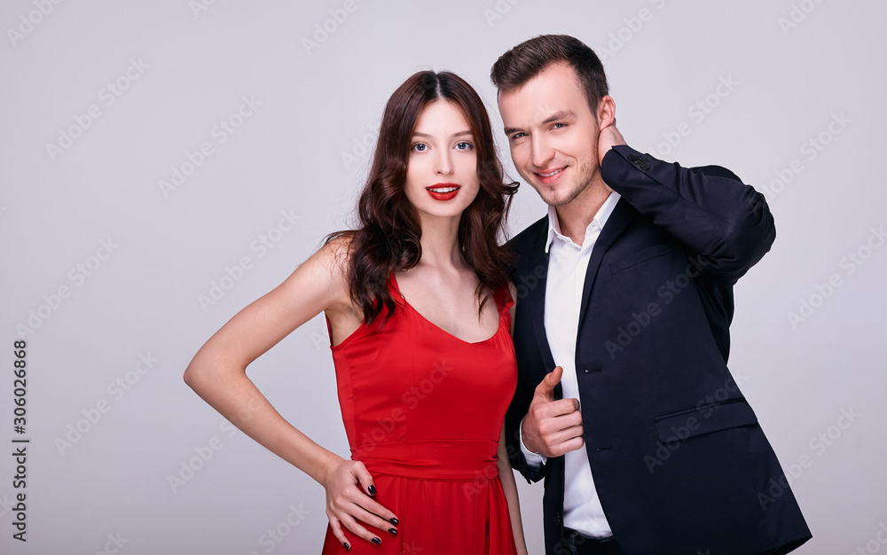 Stylish couple in bright clothes smiling. Stylish couple in bright clothes smiling.