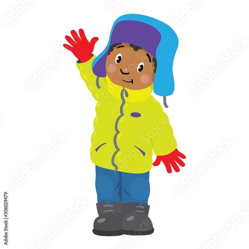 Funny little african boy in winter clothes