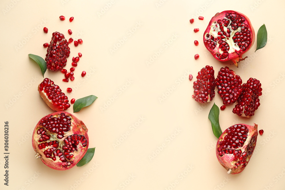 Ripe tasty pomegranates on color background Ripe tasty pomegranates on color background