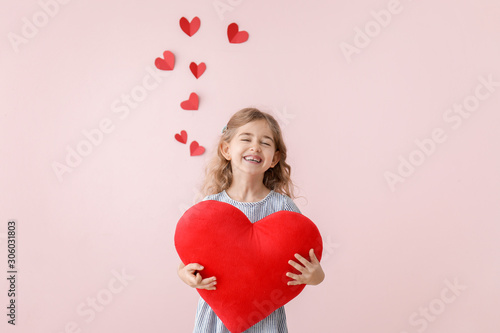 Cute little girl with pillo...