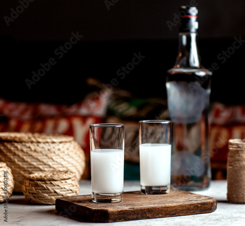 turkish beverage raki on the table photo