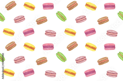 Repeat pattern of colored french macarons, souvenir of a trip to France on the white background