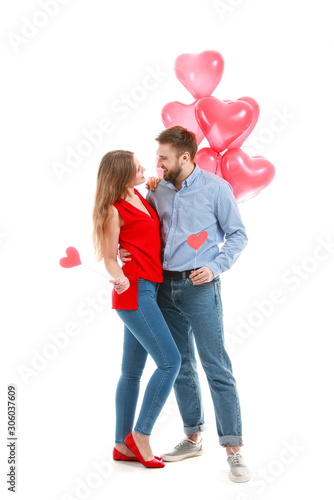 Happy young couple with hea...