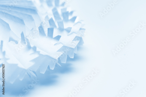 Fototapeta Naklejka Na Ścianę i Meble -  Ice cold snowflake or frost particle close up on white background