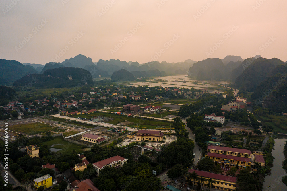 Aerial view of Tam Coc near Ninh Binh at sunset in Northern Vietnam, Asia.
