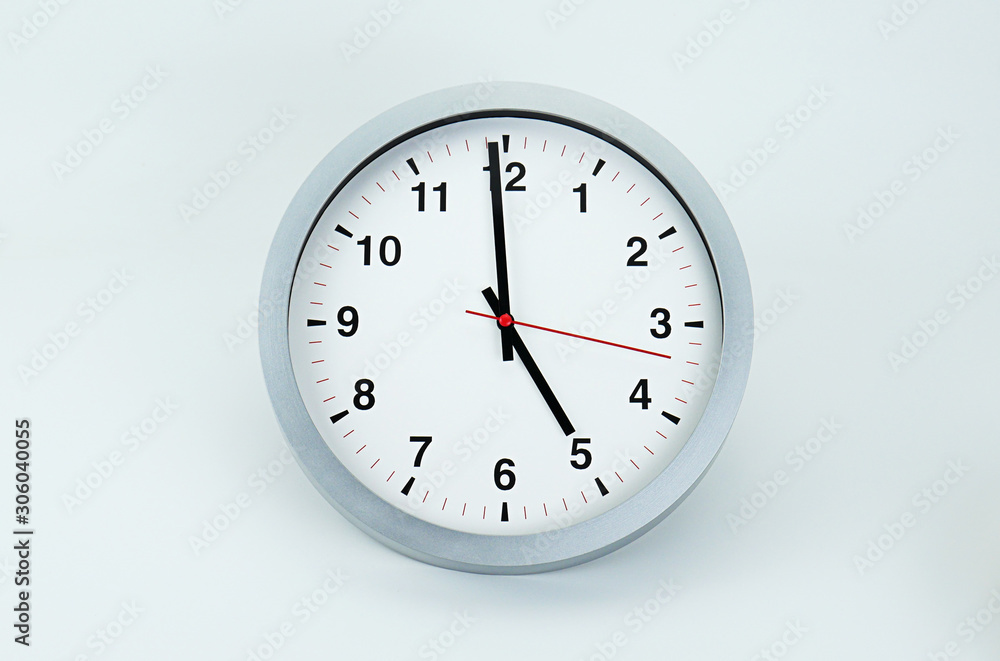 Gray clock beginning of time 05.00 am or pm, on white background, Copy space for your text, Time concept. . Gray clock beginning of time 05.00 am or pm, on white background, Copy space for your text, Time concept. .