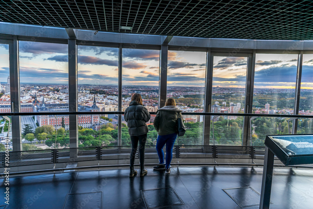  Panoramic view of Madrid from Moncloa Lighthouse in Madrid, Spain and tourists enjoying the view 