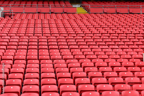 Принти на полотні Red plastic seats in a stadium