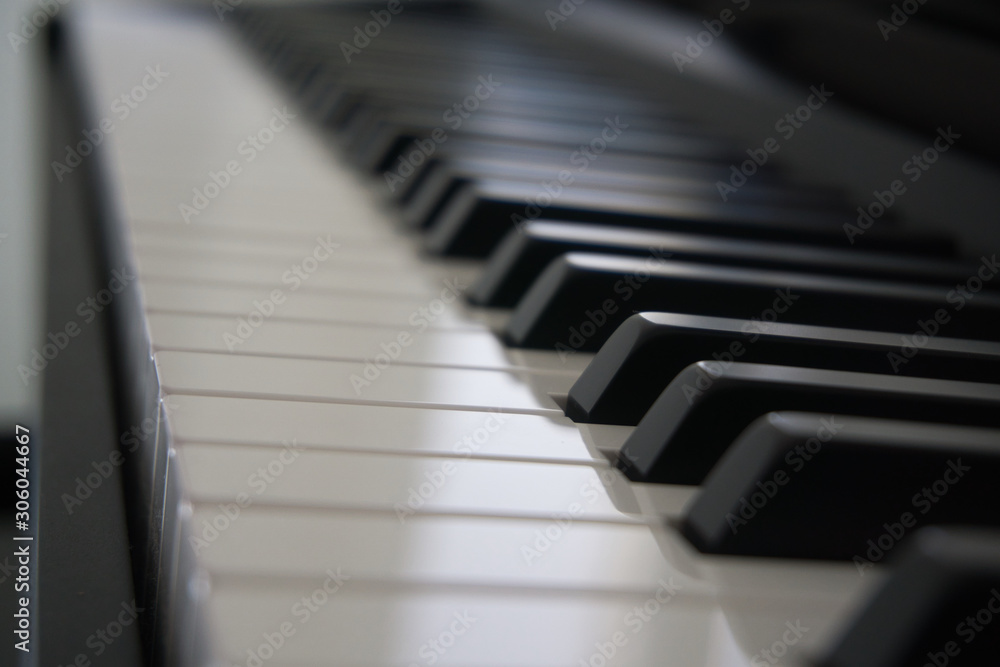 close-up o black and white piano keys close-up o black and white piano keys