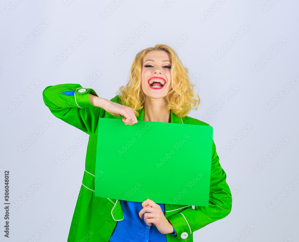 Smiling woman holds advertising board. Advertising and sale. Advertising banner. Seasons sale. Discount. Copy space for text. Stylish woman holds sign board. Market, shop, sale, discount. Sign board. Smiling woman holds advertising board. Advertising and sale. Advertising banner. Seasons sale. Discount. Copy space for text. Stylish woman holds sign board. Market, shop, sale, discount. Sign board.