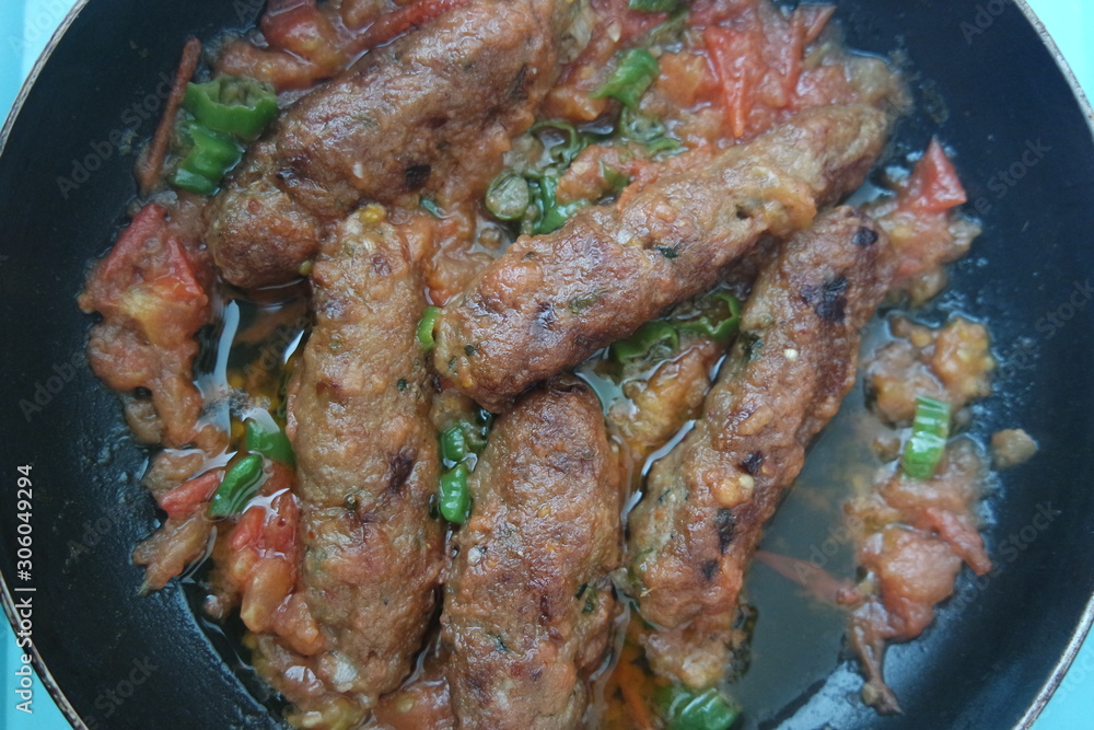 Delicious spicy home made fried kebab with green pepper