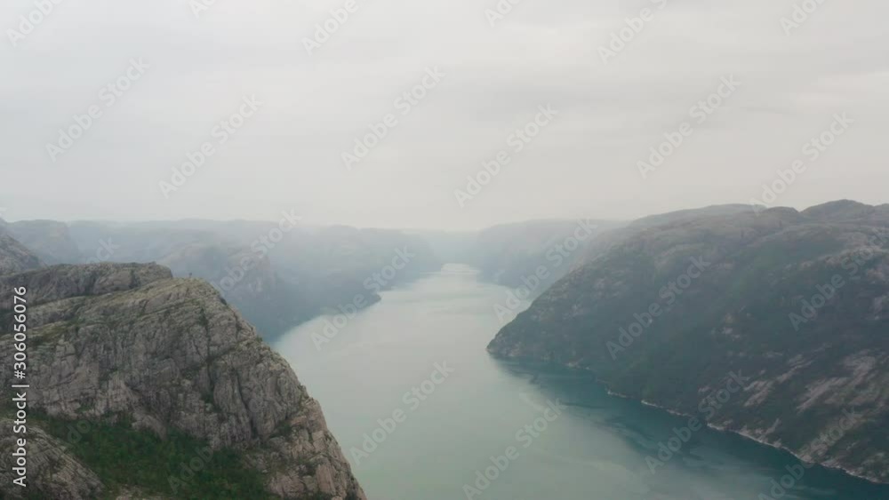 Backward Tracking Shot from a View of a Lake in the Middle of Mountains Backward Tracking Shot from a View of a Lake in the Middle of Mountains