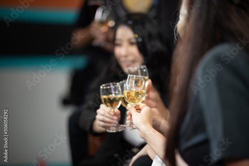 A group of working people are hanging out celebrating New Year s holidays and Christmas.