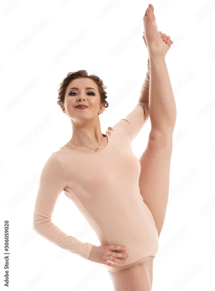 Sport. Charming gymnast doing vertical split Sport. Charming gymnast doing vertical split