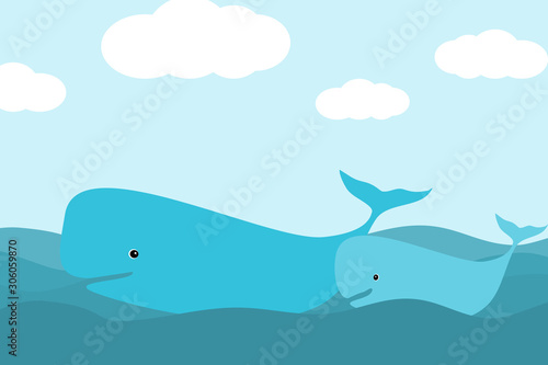 A whale and a baby whale happily swimming in the ocean.