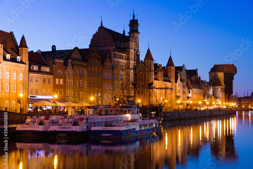View on illumination of night embankment of Moltawa River in Gdansk