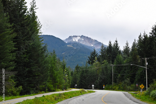 Whistler Mountain Peak from Lorimer Road in Whistler, BC, Canada during summer photo