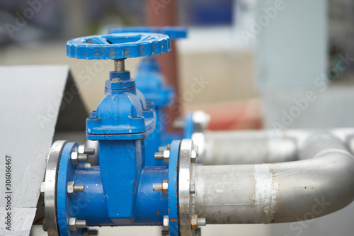 фотографія Tap valve of Metal pipe line with junction  in industrial construction factory c