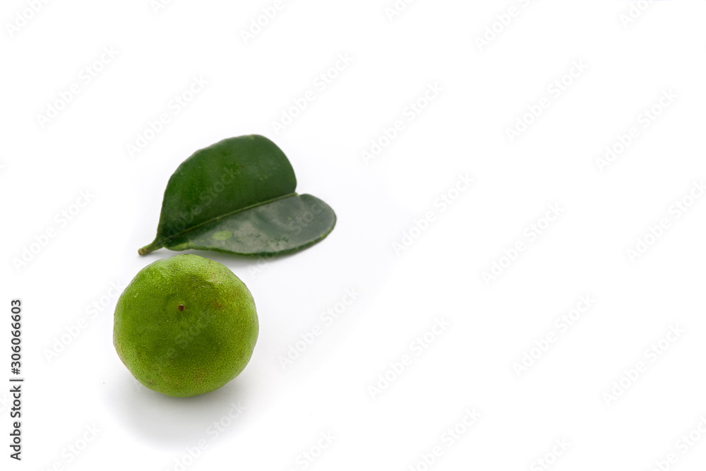 Fresh green lime with leaf isolated on white background - image Fresh green lime with leaf isolated on white background - image