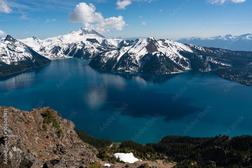 Panoramic view of mountains and turquoise coloured lake in Garibaldi provincial park, BC, Canada