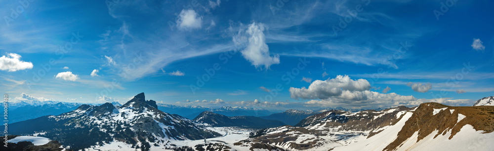 Panoramic view of Black Tusk mountain peak in Garibaldi provincial Park, British Columbia, Canada.. Panoramic view of  blue sky.