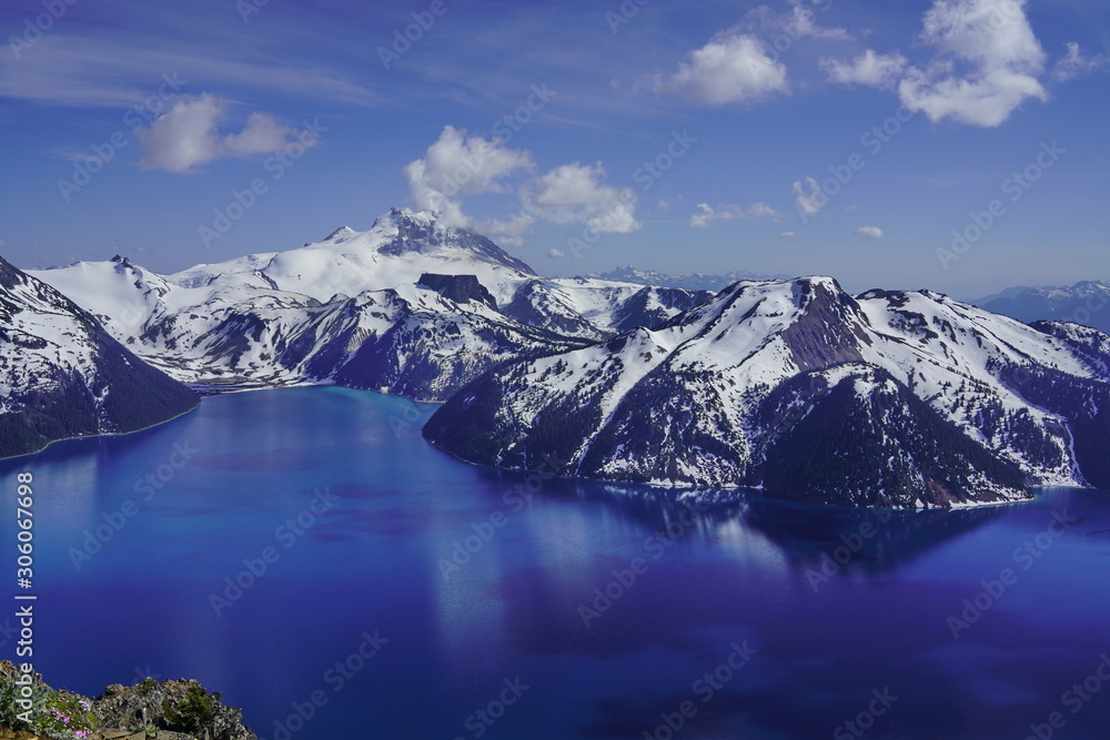 Panoramic view of mountains and turquoise coloured lake in Garibaldi provincial park, BC, Canada