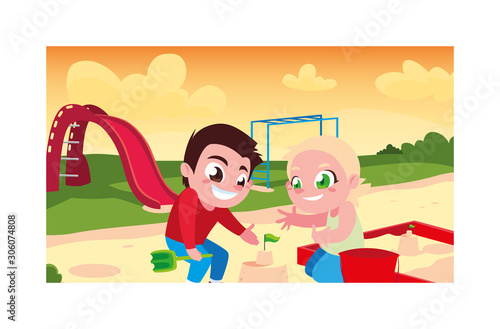 couple of children playing with sand of beach