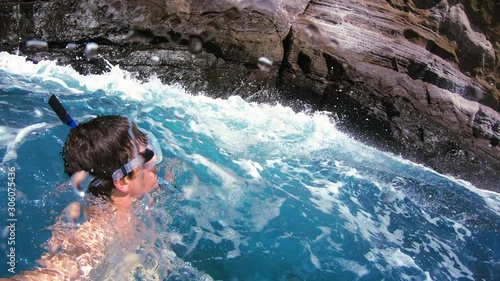 Man Swimming In Rough Blue Sea