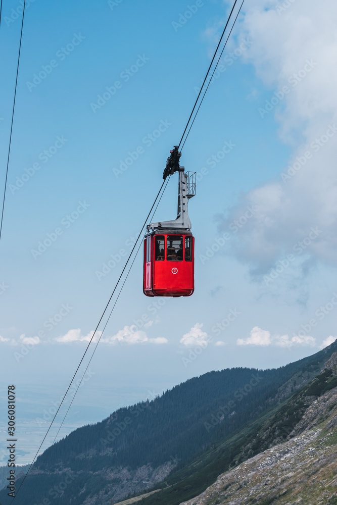 Funicular with cable car at beautiful upland area on sunny day