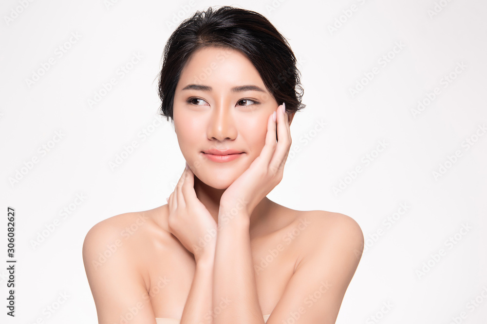 Beautiful young Asian woman touching soft cheek and smile with clean and fresh skin. Happiness and cheerful with, on white background, Beauty and Cosmetics Concept, Beautiful young Asian woman touching soft cheek and smile with clean and fresh skin. Happiness and cheerful with, on white background, Beauty and Cosmetics Concept,