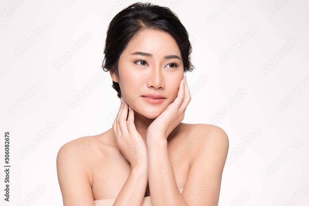 Beautiful young Asian woman touching soft cheek and smile with clean and fresh skin. Happiness and cheerful with, on white background, Beauty and Cosmetics Concept, Beautiful young Asian woman touching soft cheek and smile with clean and fresh skin. Happiness and cheerful with, on white background, Beauty and Cosmetics Concept,