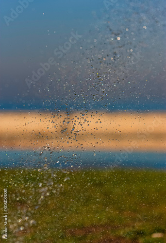 Water drops in the air and abstract background.