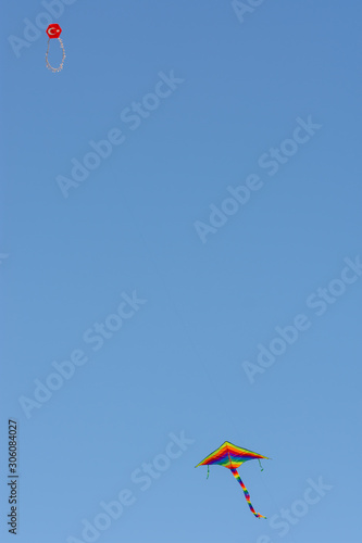 To fly kite in the blue sky. Blue sky in the background suitable for writing space