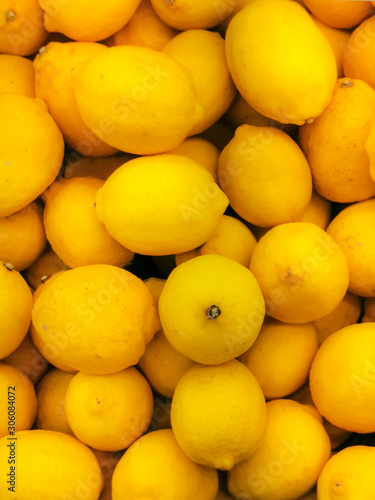 Colorful Display Of Lemons In Market. Fresh lemon 