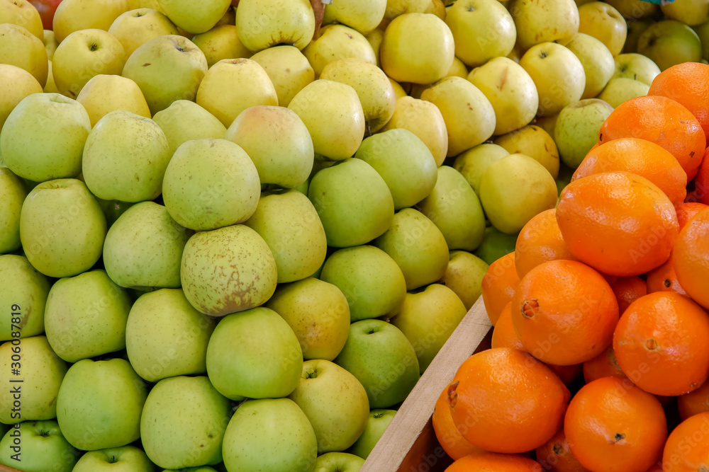 Close-up of Apples and Oranges on a Stall in Funchal Covered Market