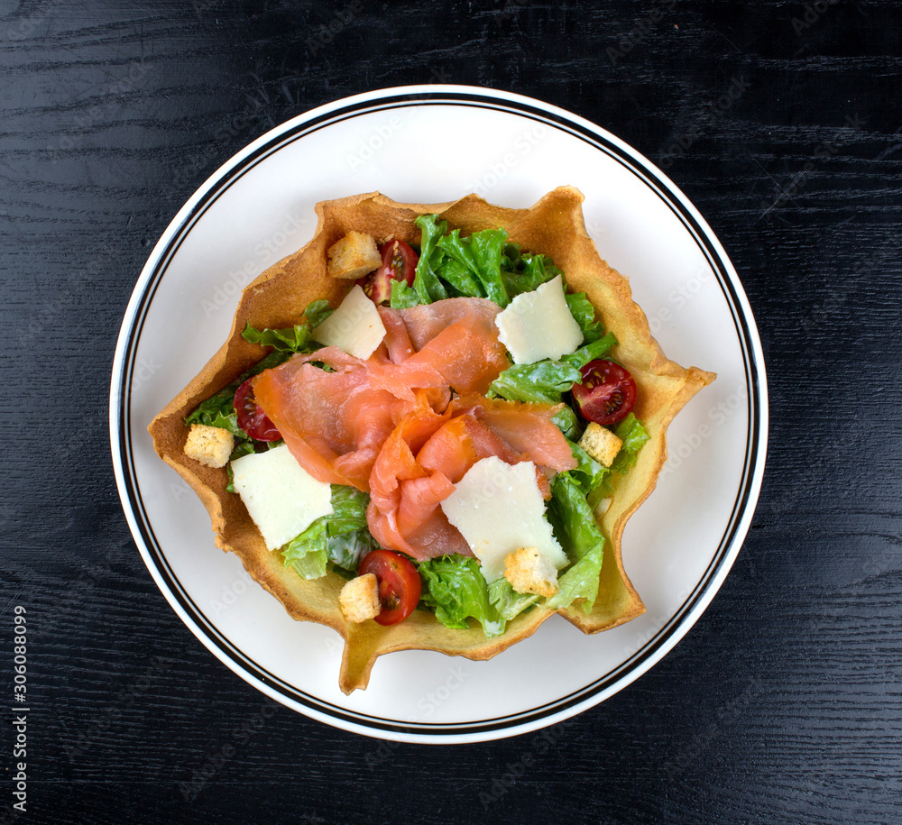 vegetable salad topped with smoked salmon and cheese vegetable salad topped with smoked salmon and cheese