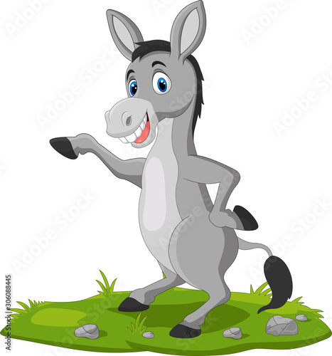 Cute donkey cartoon waving hand on the grass
