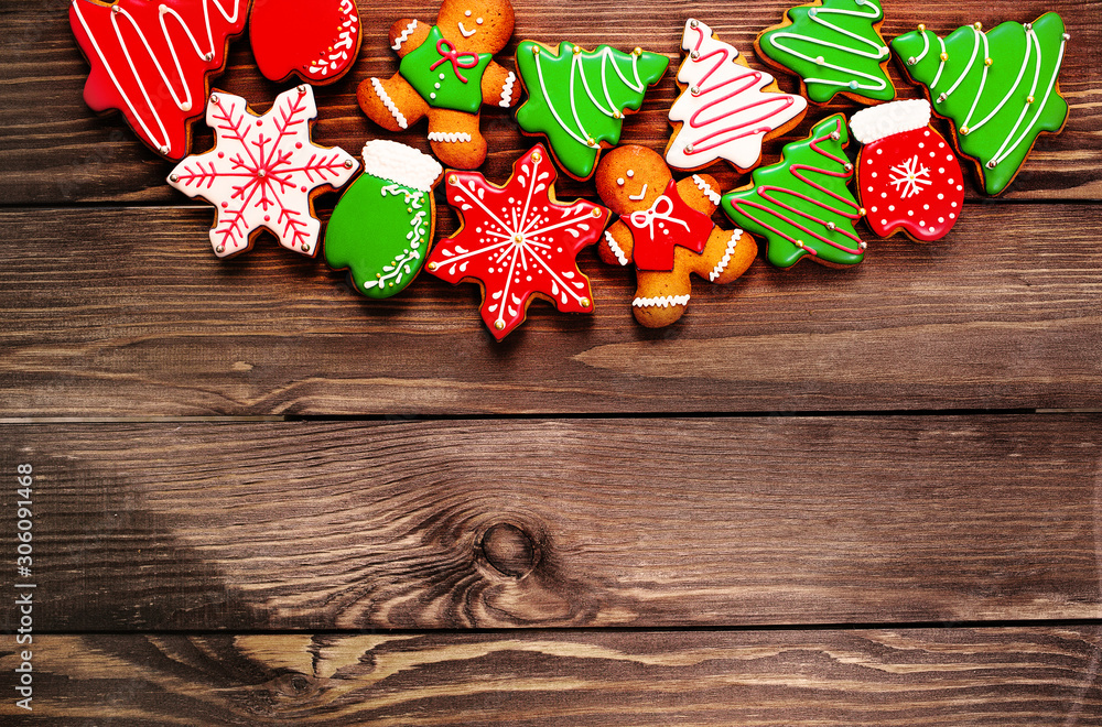 Christmas homemade gingerbread cookies on wooden table Christmas homemade gingerbread cookies on wooden table