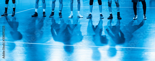 volleyball team before the match. Training and volleyball tournament. Sports teams competition. Blue filter photo