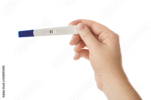 Woman hand with pregnancy test