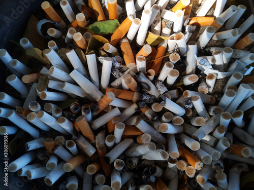 Cigarette butts and ashes, Ashtray full of cigarette butts