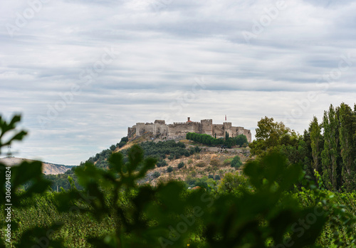 Castle on the hill. Remote view of Ayasuluk Castle  Selcuk Kalesi  and St. John s Church. 